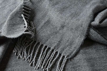 the hand on the sand shining textile scarf.の写真素材