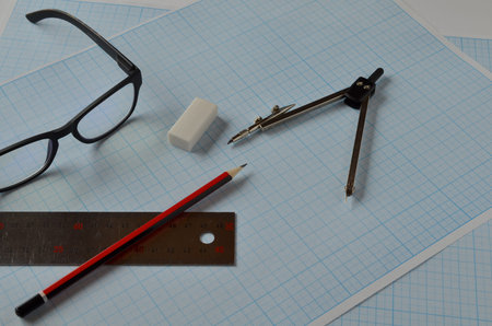 Glasses and objects for drawing on millimeter paper.