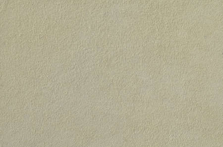 Gray suede soft leather for background. Natural texture of the suede. Space for text on the background of Shammy skin close-up. Faux suede made from polyester.の写真素材
