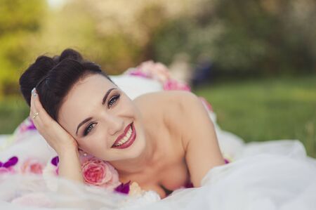 the girl on a grassの写真素材