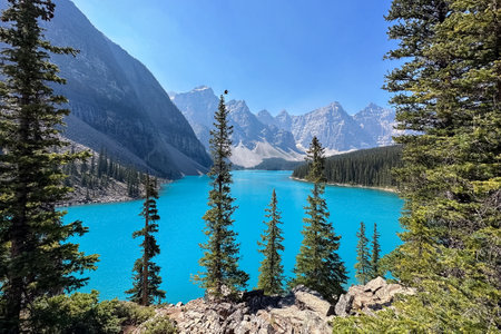 A scenic view of Moraine Lake is of mountains against the sky, Banff National Park. Alberta, Canada.の写真素材
