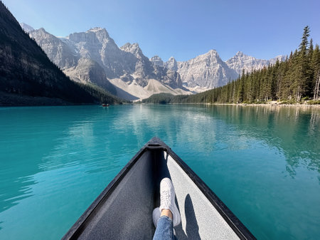 Person sitting on a boat in Lake Louise, Banff National Park, Canada.の写真素材