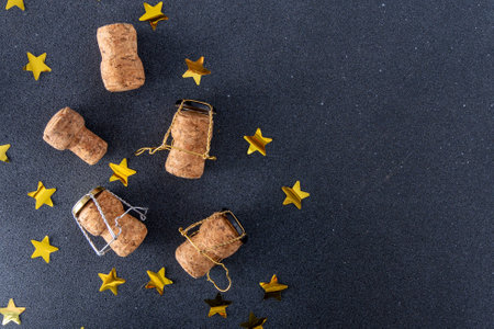 Champagne corks and metal mesh. Dark wine backgroundの写真素材