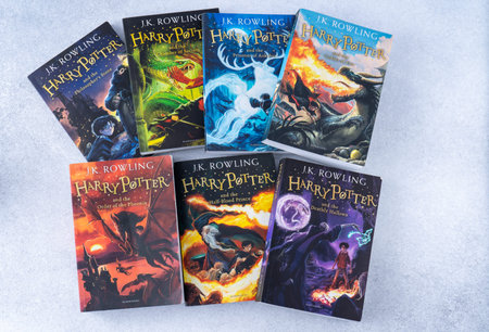 A stack of books about Harry Potter by writer JK Rowling. Collection book. Ukraine, Kyiv - January...