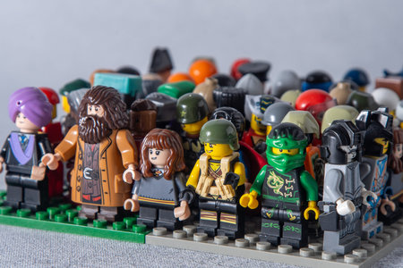 Lego mini figures set of different. Game toy man. Childrens game constructor bricks. Crowd of...