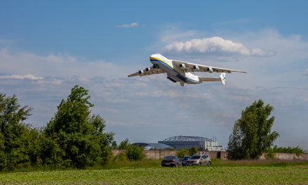 Gostomel, Ukraine - June 4, 2021: The plane Antonov 225 AN-225 Mriya, the biggest airplane in the world taking off from the airport. UR-82060 largest aircraft flying in the sky. Kyiv Kievのeditorial素材