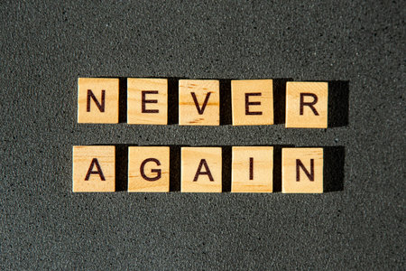Never again wooden letters