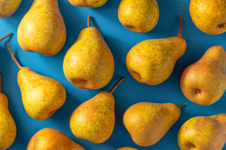 Pears on a wooden background. Fruit harvest. Autumn still life. Pear variety Bera Conference.の写真素材