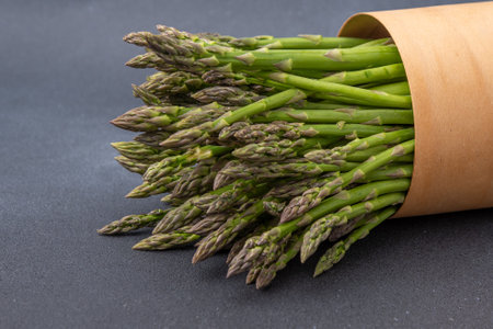 Bunch of green asparagus. Fresh spring vegetables. Vegan healthy foodの写真素材