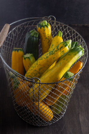 Yellow green zucchini. Vegetable marrow harvest. Food ?ourgette, summer squash. Picked courgettes.の写真素材