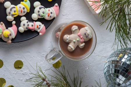 Christmas marshmallows. Winter candy. Sweet food in december. Snowman and gingerbread man candy....