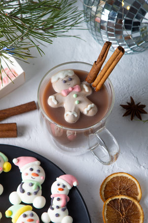 Christmas marshmallows. Winter candy. Sweet food. Snowman and gingerbread man candy. Hot cocoa drink