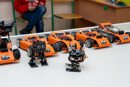 Robot cat from a DIY childrens construction set Arduino. Fundamentals of robotics at school. A toy made from circuit boards, microcircuits and batteries. Ukraine, Kyiv - December 16, 2023.のeditorial素材