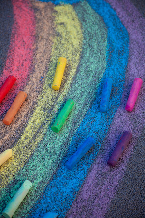 Set of colorful chalks for the board and the street. Drawing multicolored chalk stick, back to school background. Top view.の写真素材