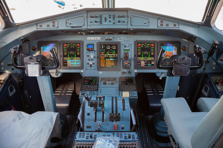 The cockpit and steering wheel of the aircraft. Pilot seat. Empty chairs. Dashboard. Aircraft UR-RWA Windrose AIRLINES. ATR 72-600のeditorial素材