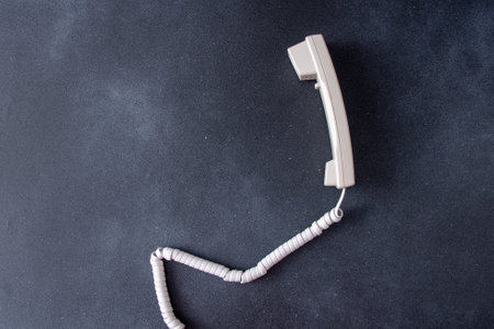 Telephone handset with cord. Old Phoneの写真素材
