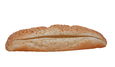 Loaf baguette isolated on white background. Bun with sesame seeds and a side cut for making sandwiches, hot dogs. Bagel isolateの写真素材