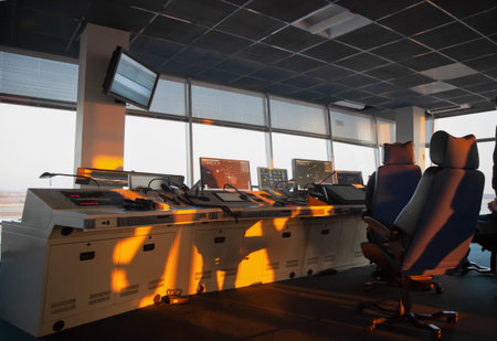 Dispatcher background. The workplace of the traffic manager at the airport at the tower. Chair,...