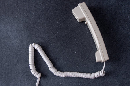 Telephone handset with cord. Old Phoneの写真素材