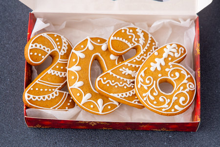 2026 numbers Gingerbread New Year date. Food background. Christmas cookies.