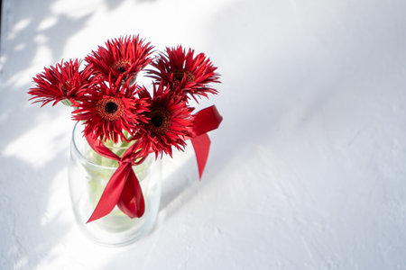 Gerbera Red Flowers in Glass Vase