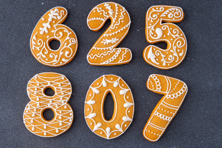 Iced Gingerbread Numbers Cookies Food background. Christmas decor.の写真素材