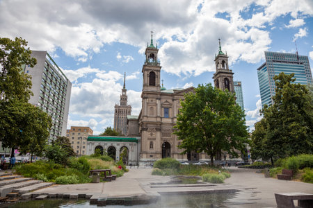 All Saints Church, Grzybowski Square Plac Grzybowski . Warsaw, Poland. houses and streets of the city center. Tourist route. Historical landmark. Old and new architecture.の写真素材