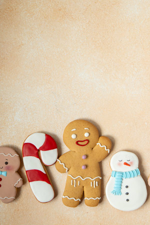 Gingerbread cookies with icing decoration. Christmas food. Gingerbread man baking. Pastry top view...