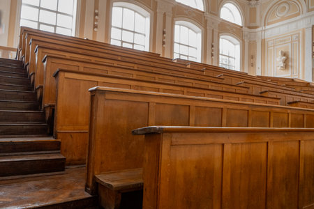 Empty Lecture Hall with Wooden Seats