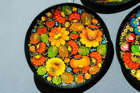 Petrykiv painting. Decorative wall plates in the Ukrainian Petrykivka paint style. Ukraine heritageの写真素材