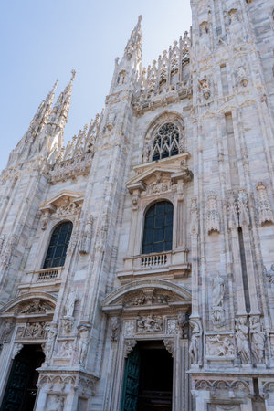 Church Milan Cathedral Duomo di Milano. Gothic architecture tourist attraction on piazza in Milan Lombardia Italyの写真素材