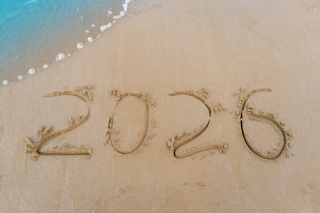 2025 numbers written in the sand.の写真素材