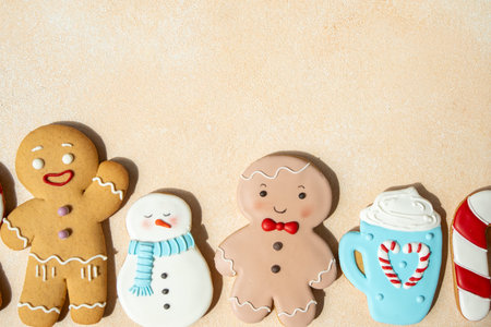 Gingerbread cookies with icing decoration. Christmas food. Gingerbread man snowman baking sweet copy...