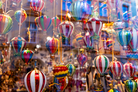 Christmas market store window. Sale of Christmas ball in the form of air balls. Colorful glass toys for the Christmas tree. Decorの写真素材