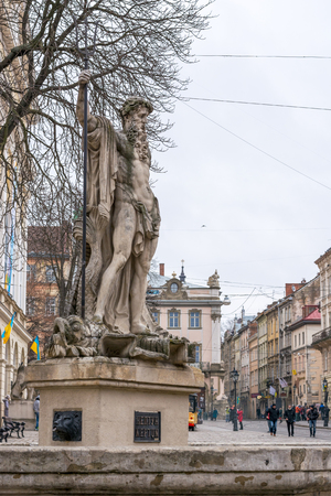 Statue of Neptune in the Rynok Square, Lviv, Ukraine. 28.11.2015. Editorial.のeditorial素材