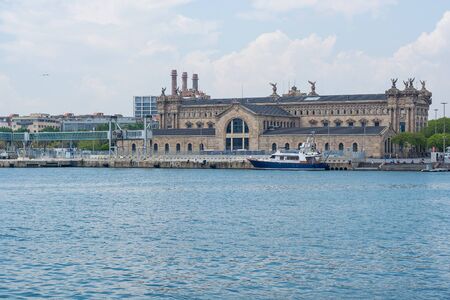 Editorial. May, 2018. Barcelona, Spain. The monumental building of the port customs is one of Barcelona's notable attractions. This ancient building is located on the port area with a symbolic name - on del Portal de la Pau "The Gate of PeaceÂ», view fromのeditorial素材