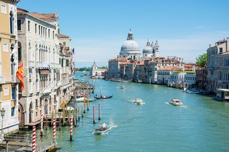 Editorial. June 2019. Venice, Italy. A sunny view of a Grand Canal, near the Venice Santa Lucia Railway Station from top of Scalzi Bridge in Veniceのeditorial素材
