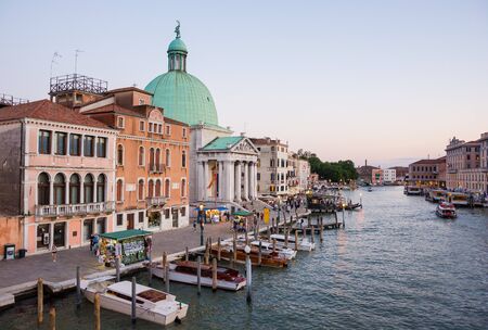 Editorial. May, 2019. Venice, Italy. A view of a Grand Canal and San Simeon Piccolo Church, near the Venice Santa Lucia Railway Station from top of Scalzi Bridge in the evening.のeditorial素材