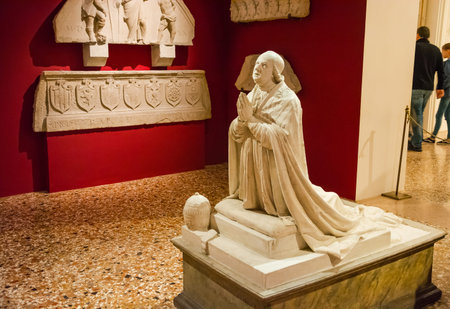 Editorial. May, 2019. Venice, Italy. A kneeling sculpture in one of the halls of the Correr Museumのeditorial素材