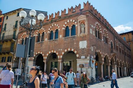 Editorial. May, 2019. Verona, Italy. The House of Merchants (Domus Mercatorum) is an amazing building of great historical value located in Piazza delle Erbe.のeditorial素材