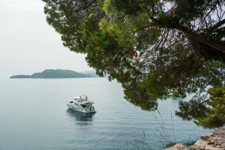 Adriatic sea view near Entrance to Milocer Park in Sveti Stefan in Montenegroの写真素材