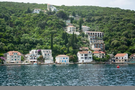 Editorial. Budva, Montenegro. June, 2021. Seascape of Montenegro and view from the sea, beautiful houses and coastlineの写真素材
