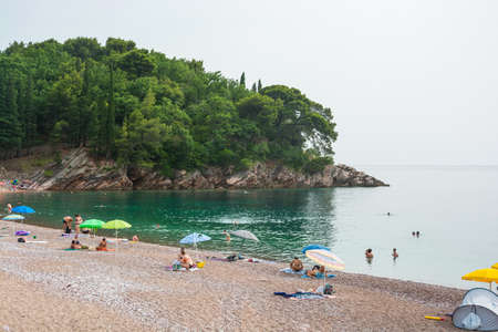 Editorial. Sveti Stefan, Montenegro. June, 2021. Landscape in the Milocher park with a view to the King's Beach in Sveti Stefan in Montenegroのeditorial素材