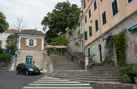 Editorial. Herceg Novi, Montenegro. June, 2021. Ladder on the old Street in the city Herceg Novi in Montenegro in summerのeditorial素材
