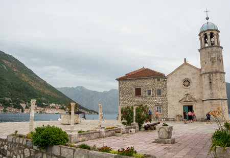 Editorial. Montenegro. June, 2021 The island of Our Lady (Gospa od Skrpjela) on the reef is located near Perastのeditorial素材