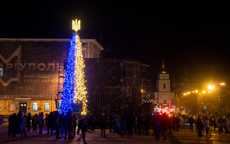 editorial. December, 2022. Kyiv, Ukraine. Christmas tree with a trident and decorations in Kyiv, in Ukraine during the war. New year 2023.のeditorial素材