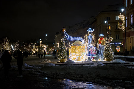 editorial. December, 2022. Warsaw, Poland. Christmas decorations in Warsaw, Poland. New year 2023. Glowing decorations near a Christmas tree in Warsaw.のeditorial素材