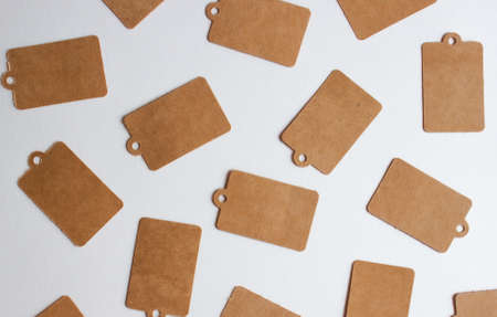 Kraft decorative cardboard paper gift price tags background.の写真素材