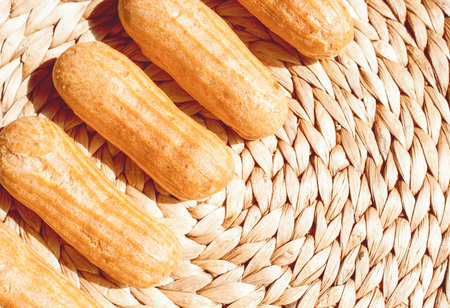 Freshly backed homemade eclair shells waiting to be filled with cream.