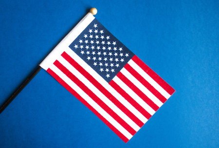 American flag on blue background. Independence Day concept, 4th of July.